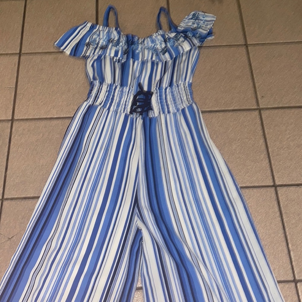 Bright blue, white, and black designed romper for any kids with a bold style!